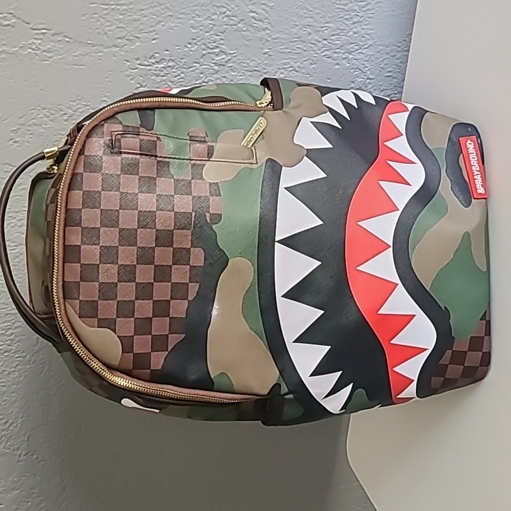 Sprayground shark bite backpack